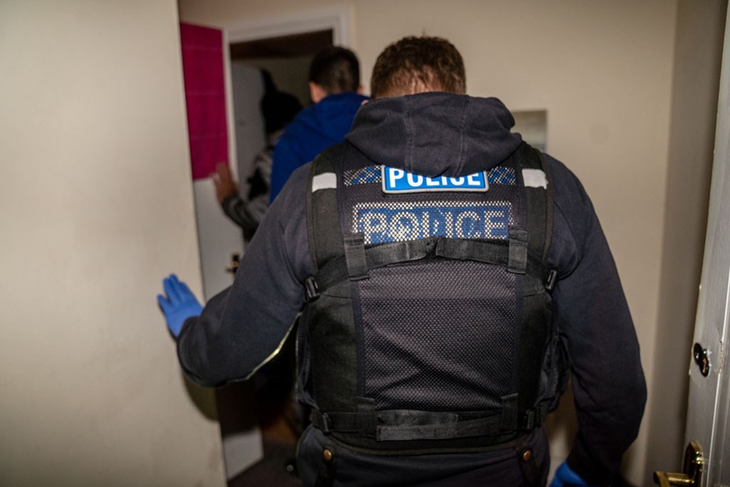 The back of a uniformed officer jacket