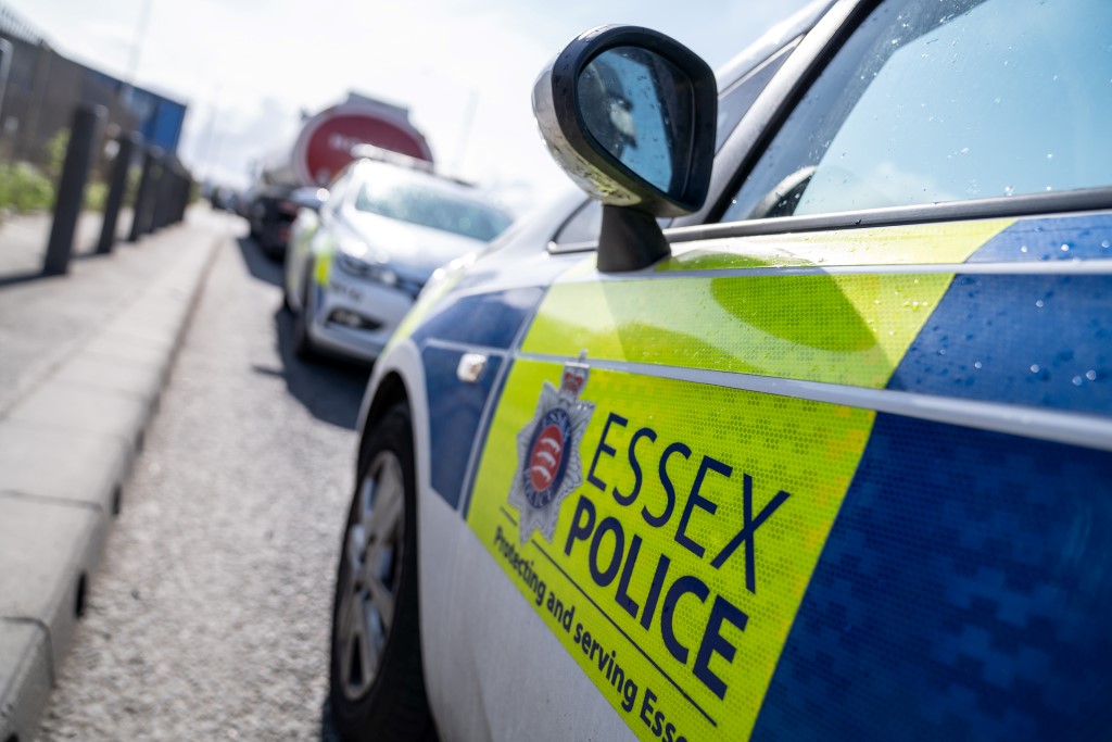 The side of a parked liveried Essex Police car