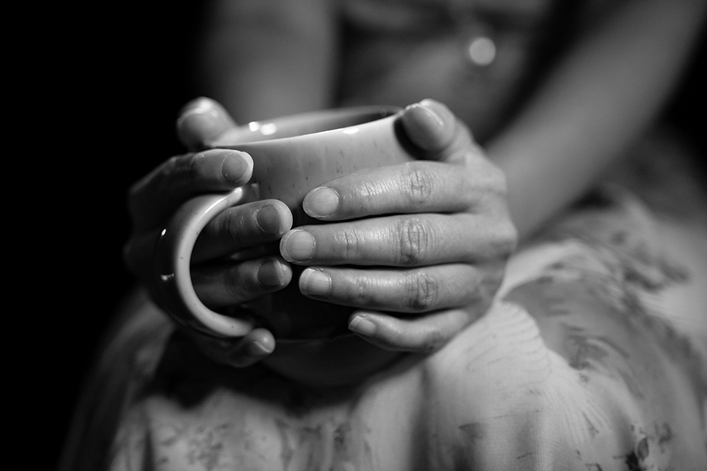 Woman holding cup
