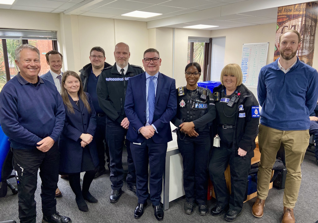 Chief Inspector Paul Ballard and council chief executive Doug Wilkinson (centre)  alongside colleagues from the PFCC, council and community policing team.