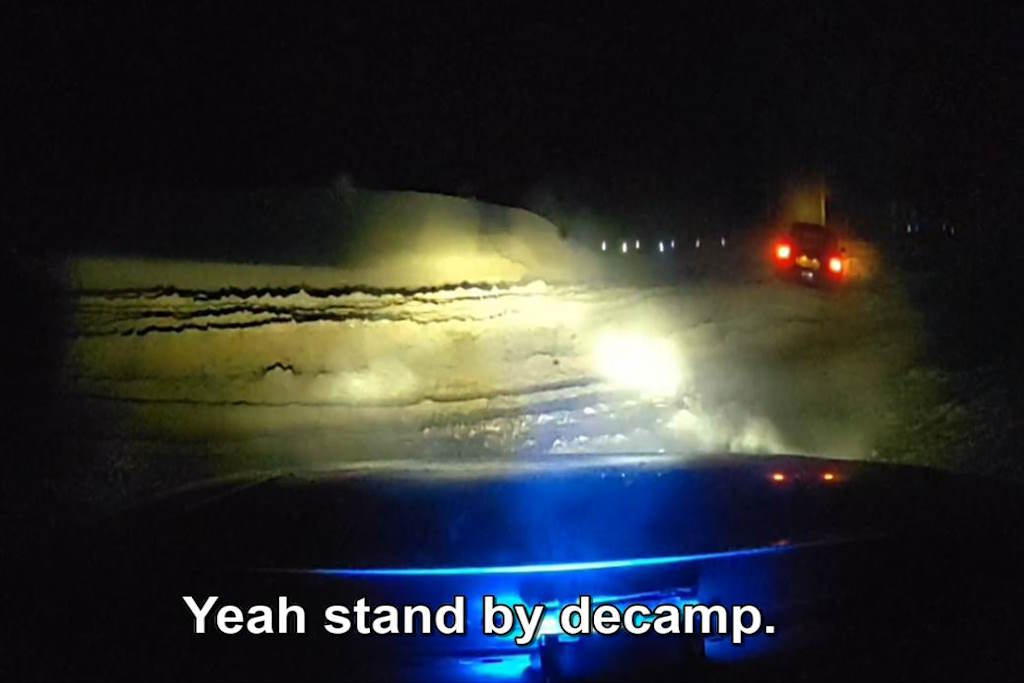 Dash cam footage showing a car in a muddy field