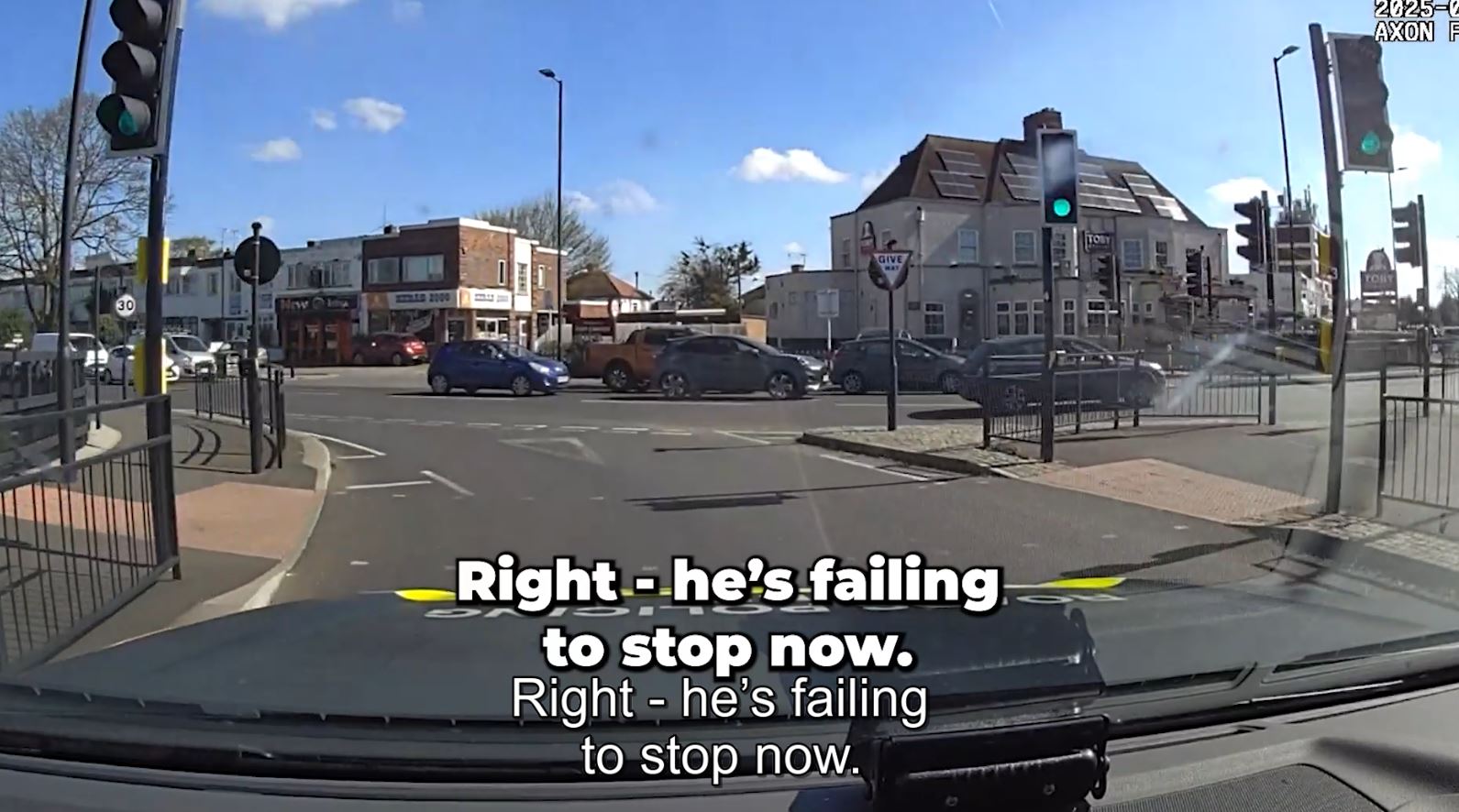 An image from the dashcam footage showing the car failing to stop