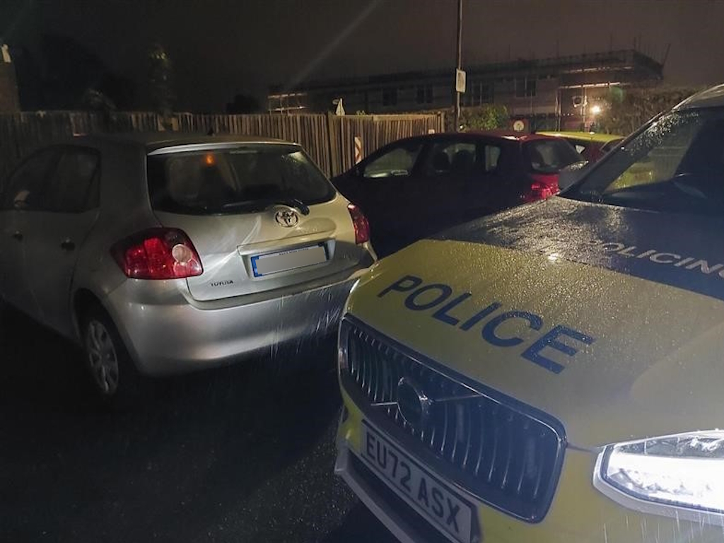 A car stopped by police officers 