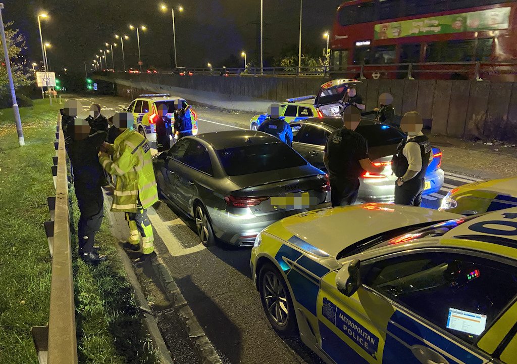 Officers make two arrests after a car is boxed in.
