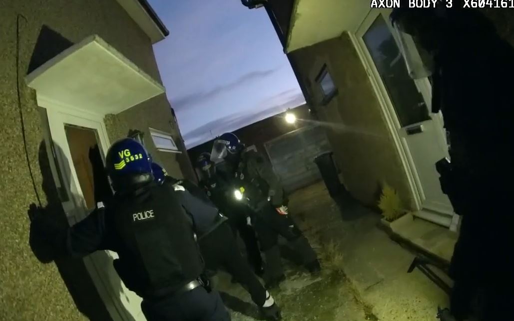 An image of a warrant being executed