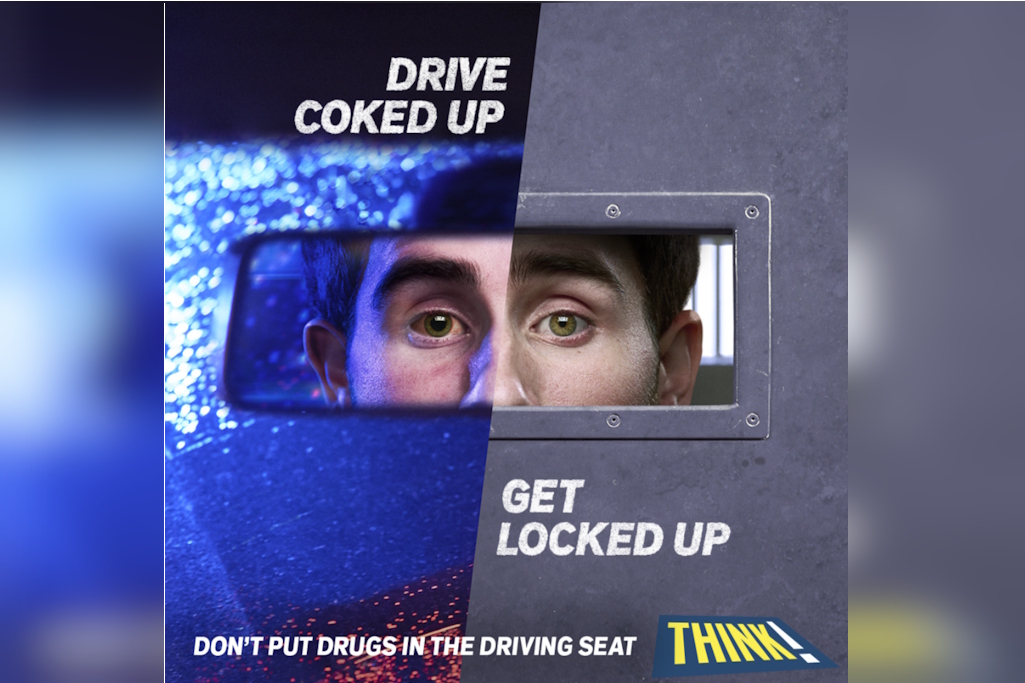 Man at car wheel with get coked up, get locked up message