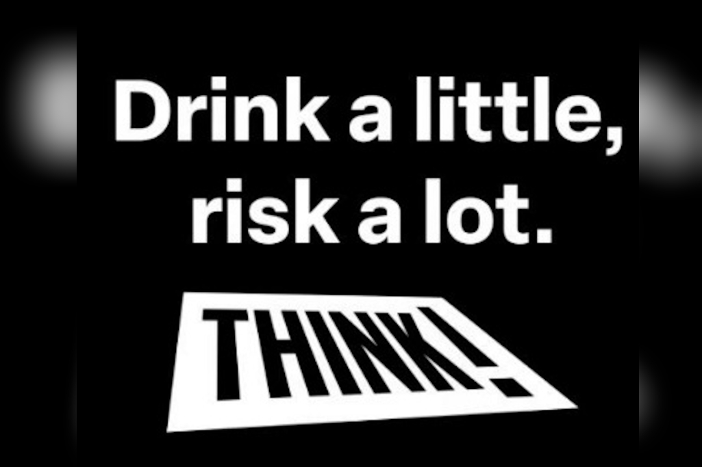 Drink a little, risk a lot - white writing on black background