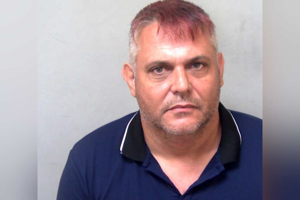 A custody image of Ricky Champ