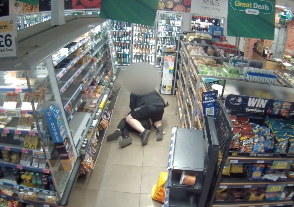The shoplifter is taken down.