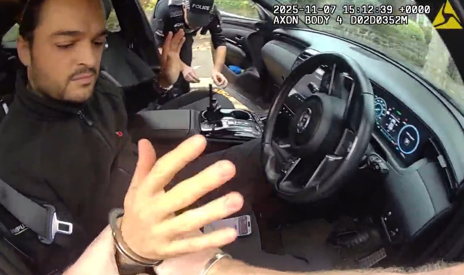 An image of Bradley Pritchard being arrested