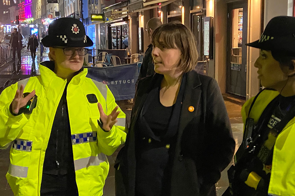 Safeguarding Minister speaking with Essex Police officers during a night-time patrol in Colchester.
