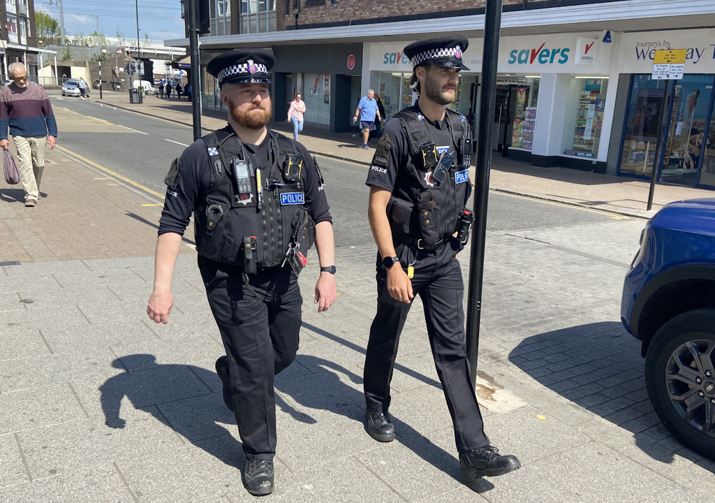 Two officers patrol Wickford High Street.