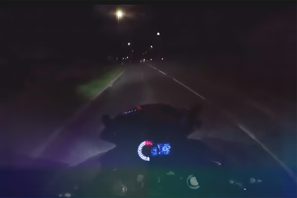 Motorbike speedometer showing 102 mph