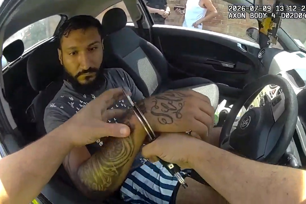 Essex Police body-worn video footage shows a man sitting in a car has his hands placed in handcuffs by a neighbourhood policing officer